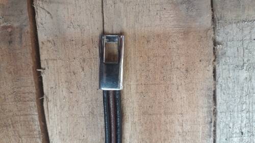 LEATHER AND SILVER TONE METAL BRACELET ''FREE COURIER''
