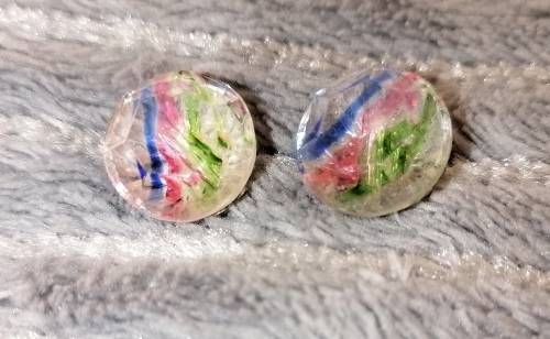 A pair of large iris crystal studs