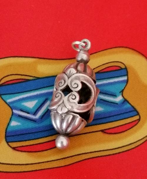 A candida sterling silver pendant or large charm