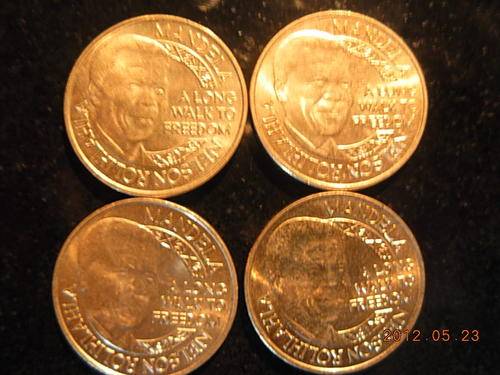 4x "a long walk to freedom" tokens, starting bids  @ only R1