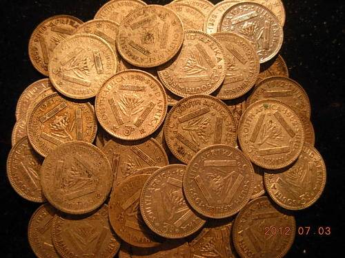 51x tickeys/ threepence coins , bid per coin.