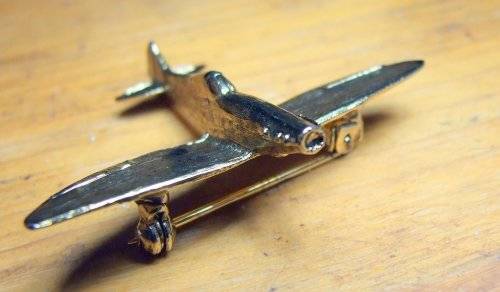 Bright, shining WW2  "Spitfire" airplane brooch, good condition.