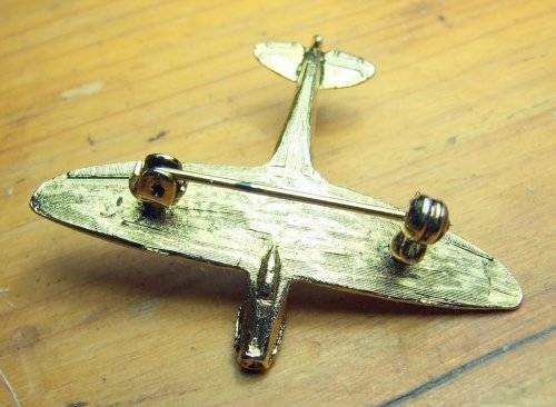 Bright, shining WW2  "Spitfire" airplane brooch, good condition.