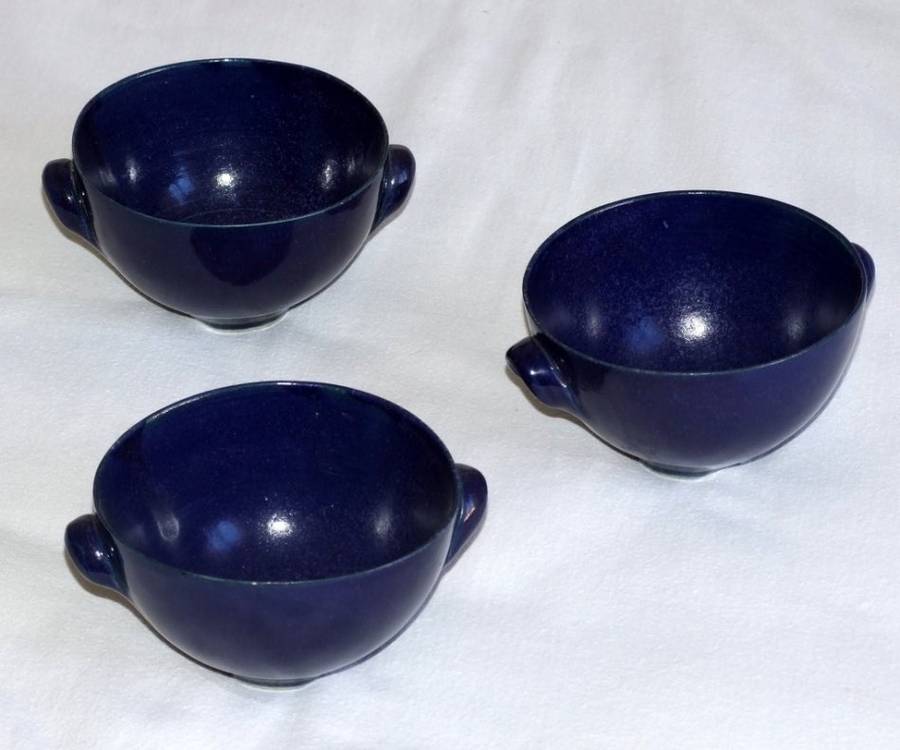 Three delightful vintage Prussian Blue Studio bowls