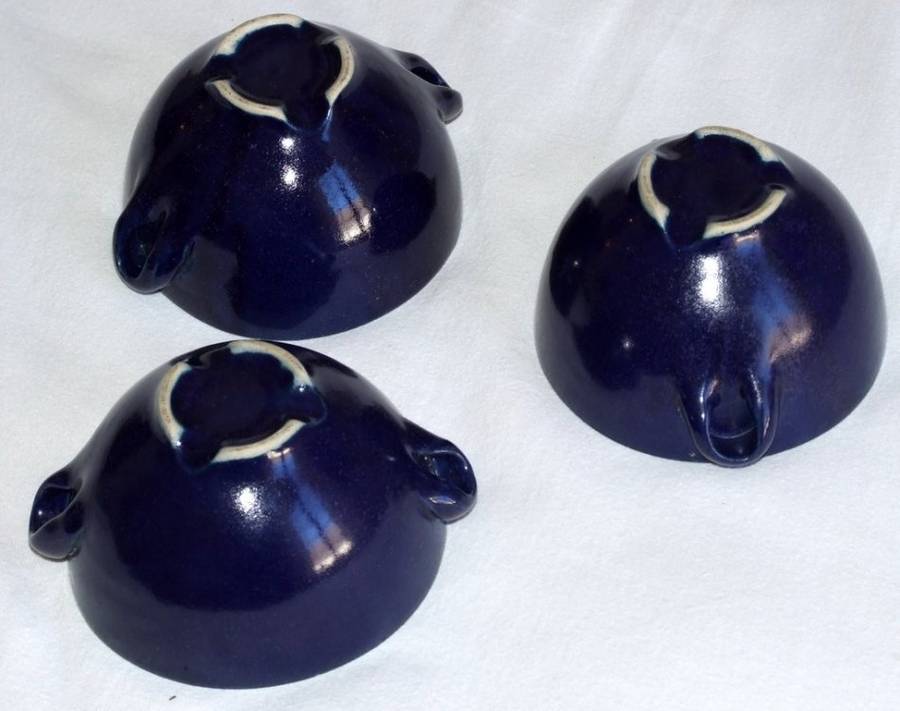 Three delightful vintage Prussian Blue Studio bowls