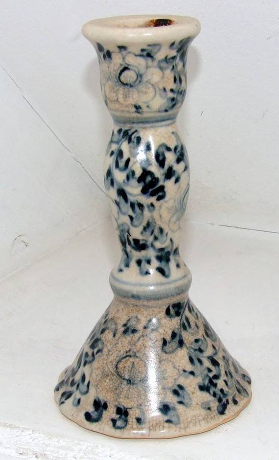 Antique blue and white ceramic candlestick.