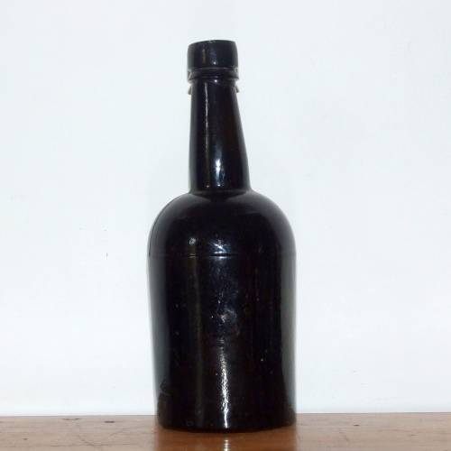 Antique black glass  bottles