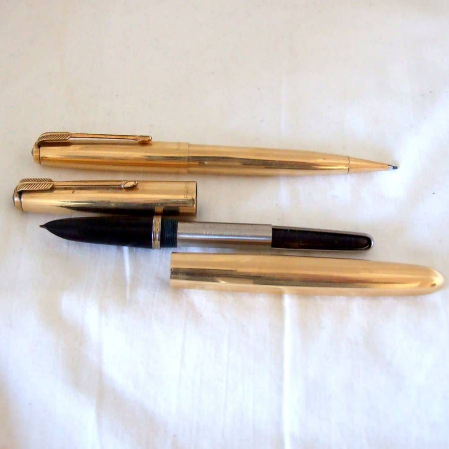 Boxed 14k gold filled Parker 51 fountain pen and pencil set, working.