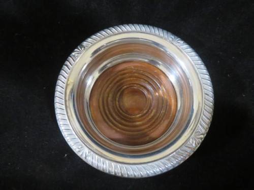 Antique silver plate and wood wine bottle coaster.