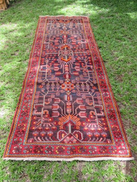 Hand knotted Persian runner.