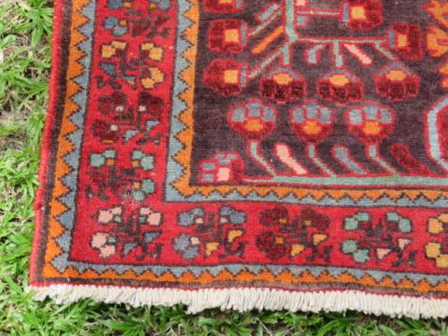 Hand knotted Persian runner.