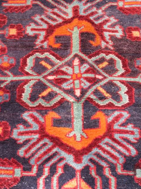 Hand knotted Persian runner.