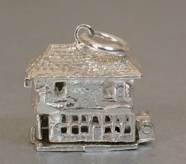 STERLING SILVER OPENING THE OLD CURIOSITY SHOP CHARM
