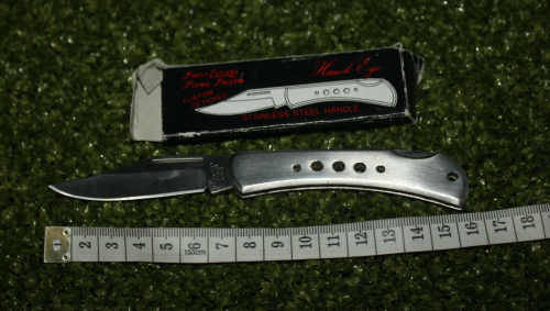 a Frost cutlery Flying Falcon Hawk Eye folding knife with origanal box