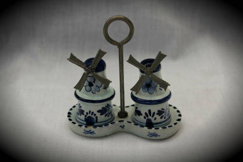 Blue and white Dutch salt and pepper set on stand -small chip on stand and on bottom 90x90x46mm