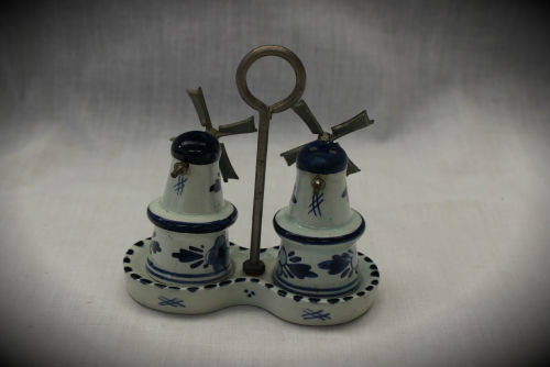 Blue and white Dutch salt and pepper set on stand -small chip on stand and on bottom 90x90x46mm