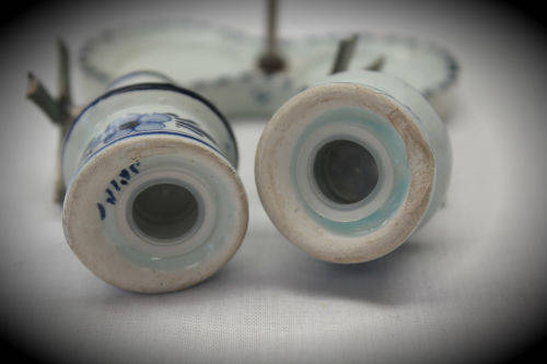 Blue and white Dutch salt and pepper set on stand -small chip on stand and on bottom 90x90x46mm