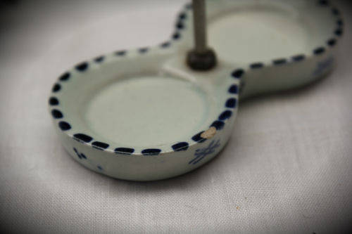 Blue and white Dutch salt and pepper set on stand -small chip on stand and on bottom 90x90x46mm