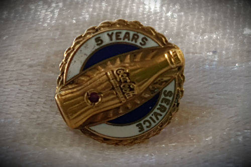 Circa 1940s.Vintage Coca-Cola 5 Year Service Pin made in 10K Gold with Jewel (Ruby?)