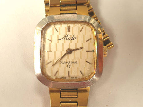 Vintage Swiss Made 1980`S MIDO Swing line Q Ladies Quartz watch  with Mido Strap-working
