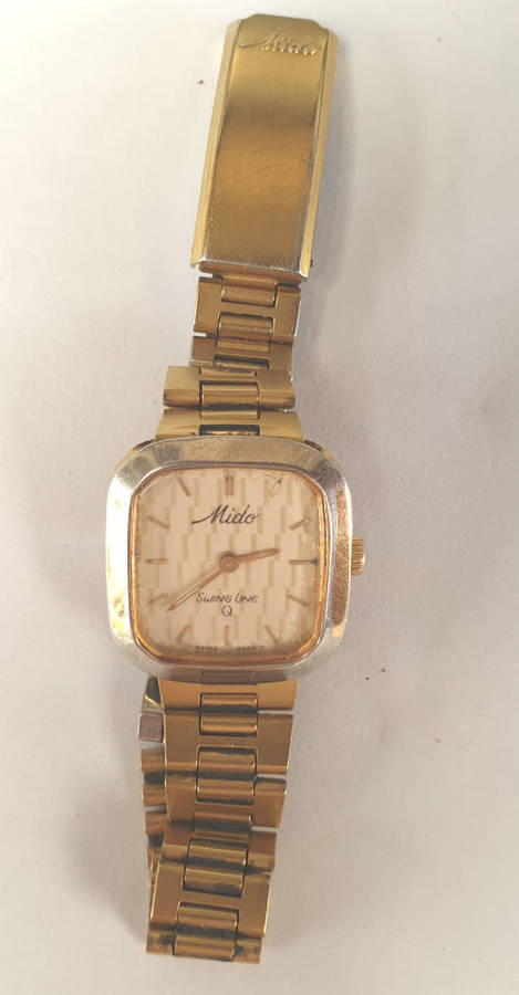 Vintage Swiss Made 1980`S MIDO Swing line Q Ladies Quartz watch  with Mido Strap-working