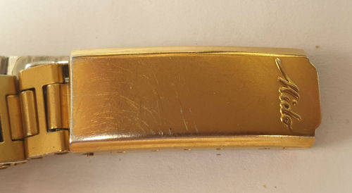 Vintage Swiss Made 1980`S MIDO Swing line Q Ladies Quartz watch  with Mido Strap-working