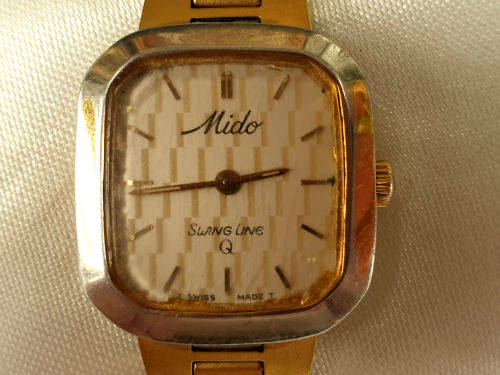 Vintage Swiss Made 1980`S MIDO Swing line Q Ladies Quartz watch  with Mido Strap-working