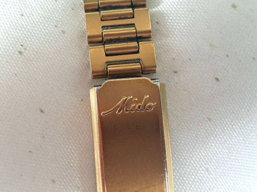 Vintage Swiss Made 1980`S MIDO Swing line Q Ladies Quartz watch  with Mido Strap-working