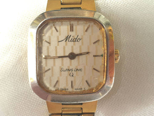 Vintage Swiss Made 1980`S MIDO Swing line Q Ladies Quartz watch  with Mido Strap-working