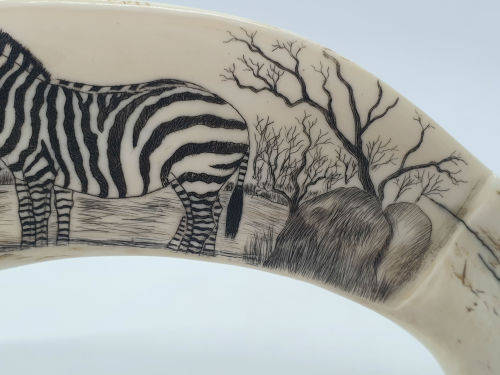 Zebra artwork on Warthog tooth on Brass stand
