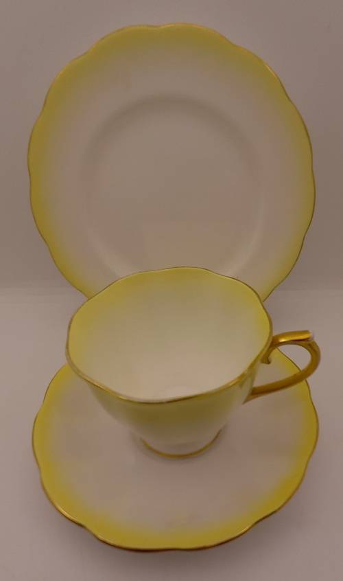 Royal Albert Rainbow Yellow tea Trio (cup has a chip on bottom rim)