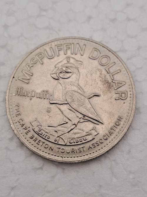 Collectable 1979  Canada MacPuffin Dollar Cape Breton Island, Nova Scotia- Tade Token