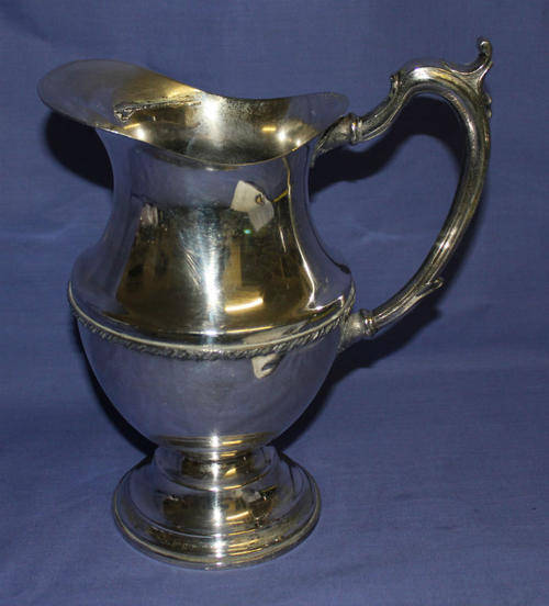 a Large Antigue Seranco B.M Mount silver plated Jug - 942g- 270mm X 220mm- see more