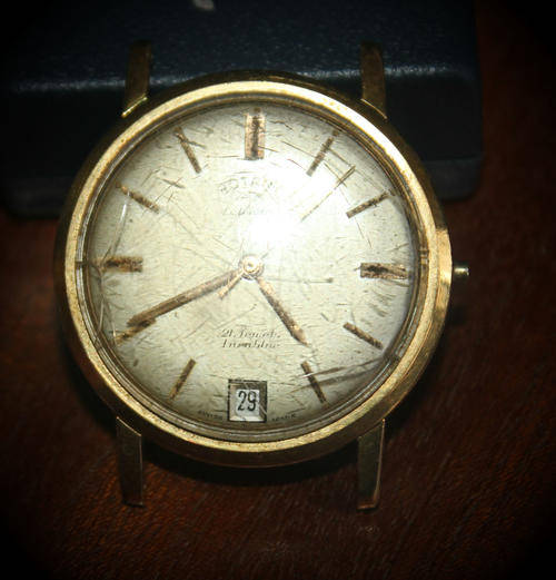 a Vintage Swiss Rotary Incabloc 21 Jewels  watch lens scratched winder missing not working