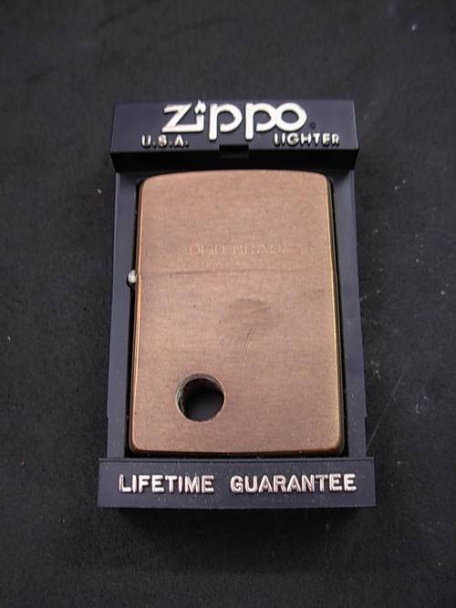 Zippo with custom hole - mint condition