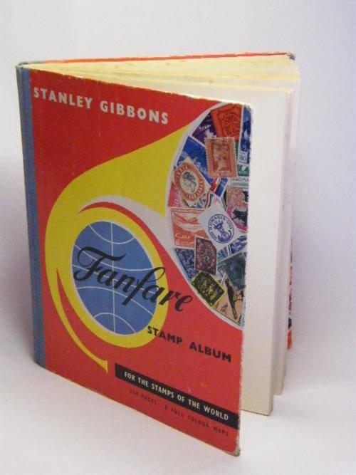 Vintage Stanley Gibbons Album with almost 900 Stamps - as per photo