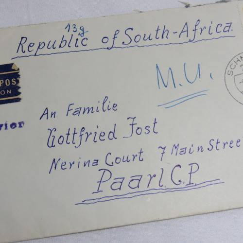Airmail cover from Schmolln, DDR to Paarl, South Africa with airmail tag and Par Avion ink cancel
