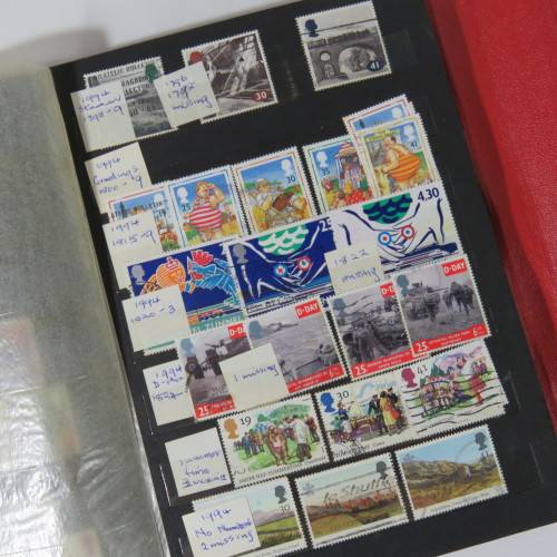 Lot of over 230 British and other stamps in album