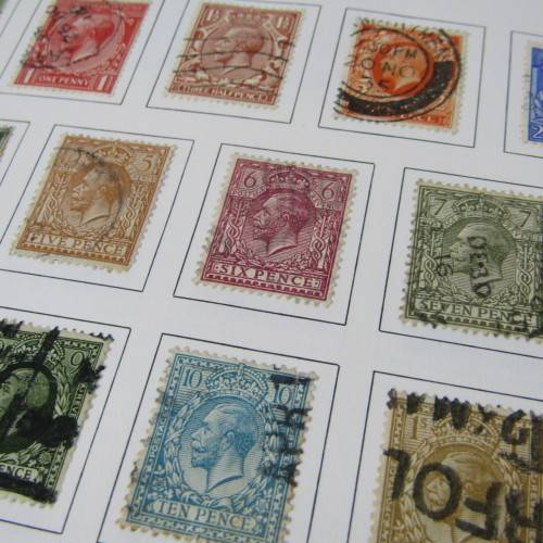 Great Britain loose leaf album with penny red and blue stamps and lots of early expensive stamps