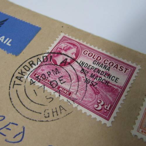 Postal cover posted from Takoradi, Ghana to Manchester, England with 2 gold Gold Coast stamps - genu