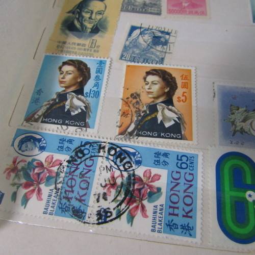 16 Page Stamp album with about 420 world stamps