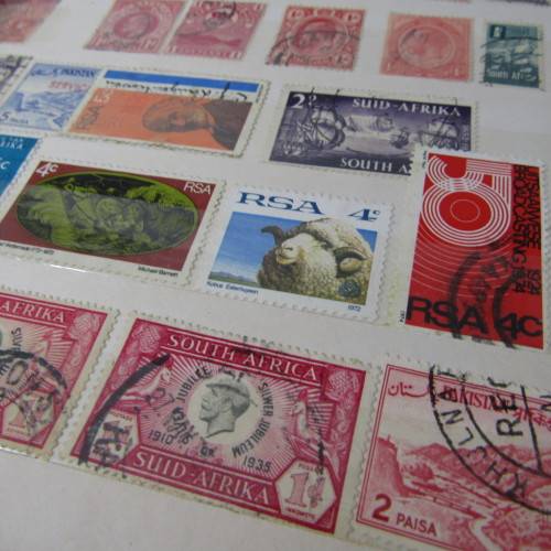 16 Page Stamp album with about 420 world stamps