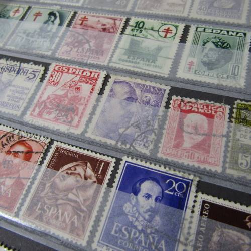 12 Page stamp album with over 500 world stamps