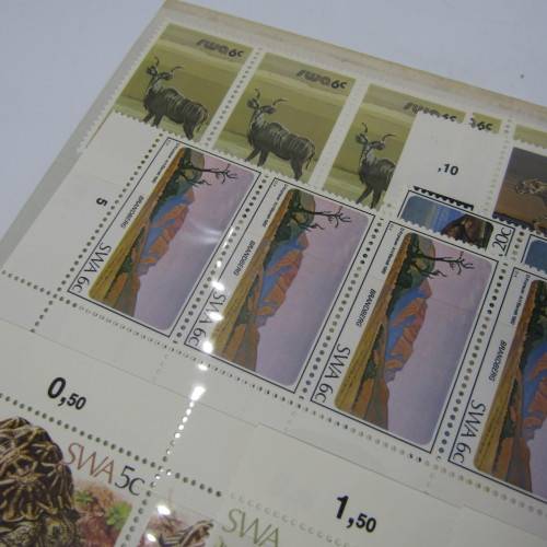 South West Africa Lot of 3 folders with about 100 SWA mint stamps