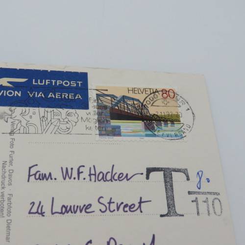 Postcard sent from Switzerland to South Africa - Taxed for insufficient postage