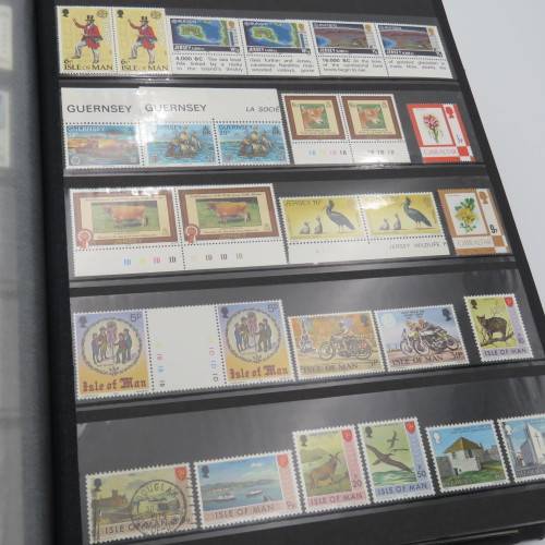 Stamp album with over 1070 stamps - England Jersey Isle of man Gibraltar mint and used