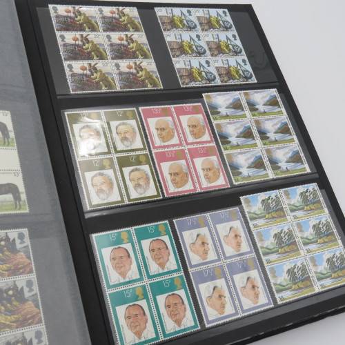 Stamp album with over 1070 stamps - England Jersey Isle of man Gibraltar mint and used