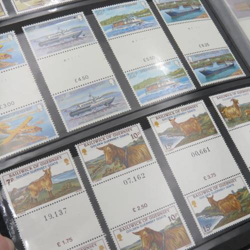 Stamp album with over 1070 stamps - England Jersey Isle of man Gibraltar mint and used