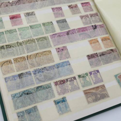 16 Page stamp album with over 700 old stamps - Some better stuff - Have a look at the photos