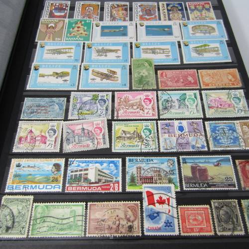 Stamp Album with over 1100 stamps - mint and used - some very good sets with album